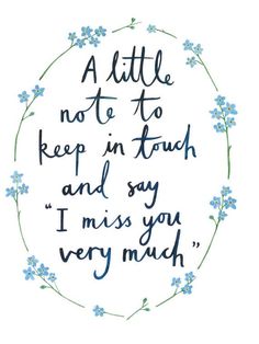 a little note to keep in touch and say i miss you very much, with blue flowers around it