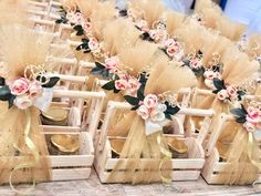 some chairs with flowers on them and ribbons tied to the seats are lined up in rows