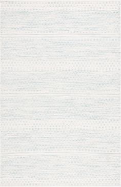 an area rug with white and blue stripes on the side, in front of a white background