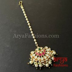 Bridal Rajwadi Kundan Mang Tika with Pearls Mang Tika: Approx. 5 Inches Hook feature to tie the mang tika to hair Made in Brass with golden finish and high quality Kundan stones Lightweight Jewelry Suitable for any occasion and traditional or Modern attire Ready to ship and available for local pickup from 23059. Please message us for more details Free shipping on orders above $75 within USA. Adjustable Kundan Tikka With Latkans, Traditional Adjustable Tikka With Stone Work, Traditional Adjustable Kundan Necklace With Stone Work, Adjustable Traditional Kundan Necklace With Stone Work, Adjustable Kundan Necklace With Tilla For Festivals, Kundan Hand Set Tikka For Puja, Kundan Hand-set Tikka For Puja, Adjustable Kundan Necklace For Puja In Temple Jewelry Style, Adjustable Temple Style Kundan Necklace