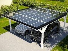 two cars are parked under a solar panel