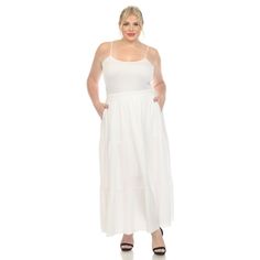 Elevate your fashion game with this flowy and effortlessly chic skirt. This maxi skirt from White Mark boasts a pleated design that adds texture, movement, and a touch of sophistication to your look. Dress it up or down as this skirt is incredibly versatile. Pair it with a tucked in blouse and heels for a sophisticated look or go for a more relaxed vibe with a tucked in tee and sandals and pair it with a jacket on chilly days. It’s perfect for various occasions and style preferences. White Lined Skirt Maxi Dress For Spring, White Flowy Maxi Dress For Day Out, White Maxi-length Bottoms For Day Out, White Maxi Length Bottoms For Day Out, White Maxi Dress With Relaxed Fit, White Maxi Length Skirt For Day Out, White Maxi Bottoms For Day Out, White Maxi Skirt For Day Out, Elegant White Maxi Dress With Elastic Waistband