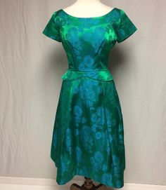 1950's Green/blue Satin Damask Dress RAPPI Peplum - Etsy Fitted Green Tea-length Dress, 1950s Style Green A-line Dress, Green Tea Length Dress For Wedding, Green Tea-length Wedding Dress, Green Tea Length Party Dress, Green Retro Cocktail Dress, Fitted Green Floral Vintage Dress, Fitted Green Vintage Dress With Floral Print, Green Satin Dress For Garden Party