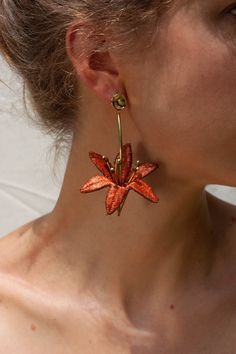 "\"Lilium are a genus of flowering plants which are important in culture and literature in much of the world. In the Victorian language of flowers, lilies portray love, ardor, and affection for your loved ones, while orange lilies stand for happiness, love, and warmth.\" - Wikipedia These light weight statement earrings are composed of hand dyed thick and rare luxurious vintage lace. Hand sewn into 6 petal flowers, they are shaped into 3 dimensional lilies with stamens of raw brass and coconut b Orange Statement Earrings, Floral Statement Earrings, Large Flower Earrings, Unique Statement Earrings, Orange Flower Earrings, Laces Aesthetic, Victorian Language, Orange Lilies, Lily Earrings