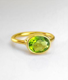 https://www.etsy.com/listing/528871116/?utm_content=buffere5a62&utm_medium=social&utm_source=pinterest.com&utm_campaign=buffer Oval Peridot Ring, August Birthstone ring, Peridot Green Stackable ring, Gemstone Ring, Gold Ring, Bezel Lisa Eldridge ring statement ring #daniquejewelry Lime Green Gemstone Birthstone Ring As Gift, Lime Green Gemstone Birthstone Ring For Gift, Green Peridot Birthstone Ring For May, Lime Green Birthstone Ring As A Gift, Peridot Rings In Lime Green As Gift, Oval Green Gemstone Birthstone Ring, Lime Green Peridot Rings For Gift, Lime Green Peridot Rings For Gifts, Green Peridot Birthstone Ring