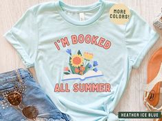 Can't. I'm booked all summer! Readers will love this shirt to wear all summer! At the library, at the beach, or just enjoying a nice book on a rainy day.  This brand of shirt is everyone's favorite. It's incredibly soft, lightweight, not boxy, just the right amount of stretch, comfortable yet cute. Your new go-to tee from Bella + Canvas. Professionally printed direct-to-garment printing, which prints the color directly into the shirt to ensure no cracking or peeling like vinyl or screen printing Bookish Style Letter Print Summer Tops, Summer School Shirt With Letter Print, Bookish Short Sleeve Tops For Spring, Summer Crew Neck Shirt For School, Summer School Graphic Tee Shirt, Spring Bookish Short Sleeve Tops, Summer Bookish Tops With Letter Print, Summer School T-shirt With Custom Print, Pre-shrunk Summer Shirt For School