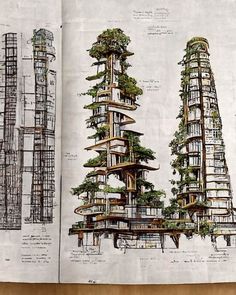 an open book with drawings of tall buildings