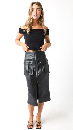 This edgy black skirt features a front zipper, slit, and cargo pockets, giving you a rebellious yet chic look. Stay on trend with this must-have addition to your wardrobe! 55% polyester, 45% PU Return Policy ALL RETURNS ARE FOR STORE CREDIT ONLY. Feel free to email us at info@shopluxxeapparel.com or DM us with any questions regarding fit, styling, or our return policy in general. To read more into our return policy please click here. Faux Leather Midi Skirt, Leather Midi Skirt, Summer Favorites, End Of Summer, Sunglasses Sale, Black Skirt, Summer Sale, Front Zipper, Return Policy