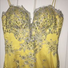 This Is A Stunning Baracci Couture Original Purchased On Rodeo Dr. It Is A Vibrant Yellow With Exquisite French Lace Overlay Dazzled With Swarovski Rhinestones, Cordless Bust Draped Over Yellow Silk Charmeuse. It’s Absolutely Breathtaking. Worn Once For 3 Hours. It’s In Immaculate And Perfect Condition. No Missing Stones Or Rips In The Lace. The Photos Do Not Do The Dress Justice It Really Is A Work Of Art. Features A Corset Detail & Zipper Closure. Open To Offers! French Lace Dress, Yellow Silk, Silk Charmeuse, French Lace, Lace Overlay, Rodeo, Lace Dress, The Dress, Couture