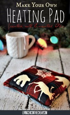 a coffee mug sitting on top of a wooden table next to a christmas tree with the words make your own heating pad