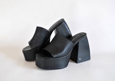 giant platform summer shoes total black platforms 90s shoes size eu 39 uk 6 us 8 vintage japanese sandals women platform slippers ------------------------------------------------------------------------------------ Giant Summer Platforms with heel, only this pair available! Leatherette and Total black / Windsor smith logo on the heel, elastic hold on side, Gaps all over due to storage... see images for details Heel is 11.5 cm ( 4.5 inches) high in the back and 5 cm ( 1.9 inches) in the front sid Japanese Sandals, Black Platforms, 90s Shoes, High Platform Shoes, Windsor Smith, Total Black, Platform Slippers, Black Platform, Sandals Women