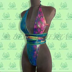 Thanks to a clever Bellacherta design, this reversible one-piece plunging neck backless halter swimsuit comes in one color when worn face up and another color when worn inside out. Flip inside out and/or tie straps differently for at least four different but equally sexy looks. Adjustable ties ensure a completely personalized fit . Available in any size and various colors. *** Please feel free to contact us with any questions - we will respond at once and try to accommodate all your wishes. Than Designer Swimsuit, Spandex Bodysuit, Halter Swimsuit, Plunging Neck, Swimsuits Halter, Rave Outfits, One Color, Inside Out, One Piece