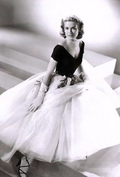 black and white photograph of a woman in a dress