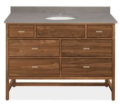 an image of a bathroom vanity with drawers and a marble counter top on white background