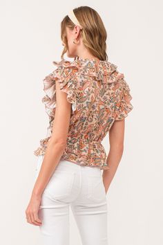 Multi ruffle top, v-neck front with spaghetti self neck ties & elastic waist. Multi print woven on standard fit. Gracing a soiree & strolling through sun-kissed day, whispers of sophistication & ever desired...Body length from HPS: 22", Armhole ruffle: 5 1/2", Bust: 39" (Size Small) 100% COTTON Machine wash cold, Tumble dry low Imported Kiss Day, Ruffle Top, Neck Tie, Elastic Waist, Elastic, Paisley, V Neck