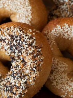 several bagels with sesame seeds and sprinkles