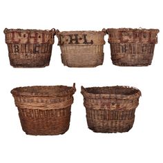 four woven baskets with the word hell written on them