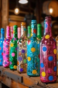 colorful bottles are lined up on a shelf