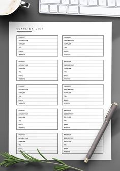 the printable list is sitting on top of a desk next to a keyboard and coffee cup