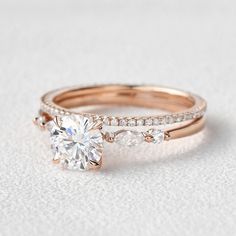 a rose gold engagement ring set with a round diamond