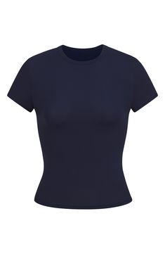 This crewneck T-shirt that perfectly hugs your curves features a buttery-soft feel and is from Kim Kardashian's sought-after SKIMS. 20 1/2" length (size Medium) Crewneck 79% nylon, 21% spandex Machine wash, line dry Imported Skims Smoothing Tshirt, Skims Jersey Tee, Tight Fit Tshirts, Navy Clothes, Fitted Tshirt, Navy Blue Shirt, Navy Blue T Shirt, Fitted Shirts, Navy Blue Shirts