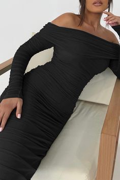 Look and feel sophisticated wearing this beautiful off-shoulder and ruched long-sleeve maxi dress. Enjoy its flattering fit and luxurious fabric for a statement-making look. Perfect for special occasions or everyday wear. 90% Polyamide, 10% Elastane Imported Polyester lining Pull On closure Machine Wash Brand Size Dress Bust Waist Hip XS 0-2 31-32.5'' 23-24'' 31-34" S 4--6 33-35'' 25-26'' 35-37" M 8--10 35-36'' 27-28'' 38-39" L 12--14 38-40'' 29-31'' 40-42" XL 14-16 40-42'' 33.5-36'' 44-46" 2XL Black Ruched Off Shoulder Evening Dress, Black Ruched Off Shoulder Dress For Evening, Chic Ruched Draped Off Shoulder Dress, Chic Ruched Off Shoulder Draped Dress, Chic Ruched Off-shoulder Draped Dress, Off Shoulder Ruched Midi Dress For Evening, Elegant Ruched Off Shoulder Stretch Dress, Long Sleeve Ruched Maxi Dress For Dinner, Ruched Off Shoulder Dress For Night Out