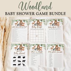 the woodland baby shower game bundle is shown on top of a blanket with other items