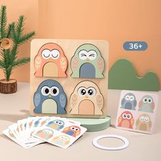 an assortment of wooden toys including cards and magnets