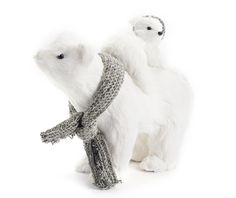 two white polar bears wearing scarves and scarfs