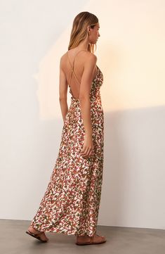 Take a break from the waves in this flowy silk-kissed dress designed with golden straps at the open back and a colorful print. Slips on over head Deep V-neck Sleeveless Lined 80% rayon, 20% silk Dry clean Made in Brazil Hispanic & Latinx Owned/Founded Vix Swimwear, Pink Maxi Dress, Take A Break, Nordstrom Dresses, Deep V Neck, Open Back, Long Dress, Designer Dresses, Brazil