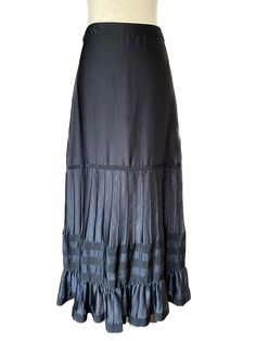 Mercata Imports Mercatina offers this gorgeous GIORGIO ARMANI Black Rayon Tiered Ribboned Ruffle Maxi Skirt Made in Italy Excellent condition, never worn. Size Medium (40 EU) Elegant Tiered Relaxed Skirt, Elegant Tiered Voluminous Skirt, Elegant Tiered Voluminous Maxi Skirt, Elegant Tiered Flowy Skirt, Elegant Pleated Skirt With Ruffles And Voluminous Fit, Elegant Black Pleated Skirt With Ruffles, Elegant Voluminous Pleated Skirt With Ruffles, Elegant Tiered Black Bottoms, Elegant Black Tiered Bottoms