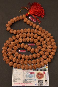 "Product Name : Shri Rudram 10 Mukhi Rudraksha Mala / Ten Face Rudraksh Rosary Java Lab Certified Bead Origin : Java / Indonesia Bead Size : 12 - 14 MM Total Beads : 108 + 1 = 109 Rosary Length : 42 Inches around the Neck. Attachment : Rosary Will be Shipped Along with its Lab Certificate 📿Our Mala is handcrafted with Ten Mukhi Natural Rudraksha Beads. It symbolizes the Gods of all the 10 directions and the wearer gets blessed by these Gods. The ten faces Rudraksha have ten natural lines on its Traditional Brown Mala For Festivals, Traditional Multicolor Mala For Puja, Multicolor Mala For Puja And Festive Occasions, Festive Rituals Mala With Pallu, Navratri Puja Cutdana Mala, Multicolor Mala For Rituals And Festivals, Diwali Rituals Mala With Pallu, Traditional Festive Mala For Meditation, Cutdana Mala For Rituals And Festivals