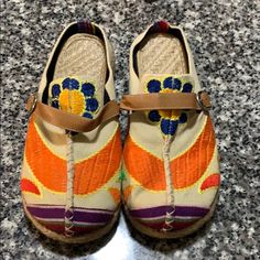 Embroidered Clogs. Size 7. Euro 38. Hemp/Rope Detailing Around The Bottom. Rubber Soles. Tan W/ Tan Straps & Silver Buckle. Not Sure Of The Maker. Purchased From Zulily. The Box Looks To Have Chinese Writing On It, And Tag That Says “Orange Floral Buckle-Accent Mule N5097 Orange Floral Size 7.” Purchased For $65. Smoke Free / Pet Free Home. Multicolor Slip-on Casual Clogs, Casual Multicolor Closed Toe Clogs, Comfortable Multicolor Closed Toe Clogs, Casual Multicolor Mules With Rubber Sole, Casual Beige Clogs With Woven Sole, Spring Bohemian Clogs With Round Toe, Casual Clogs With Woven Sole And Round Toe, Multicolor Mules With Rubber Sole And Round Toe, Casual Open Toe Clogs With Woven Sole