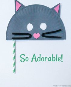 a paper plate with a cat's head on it and the words so adorable