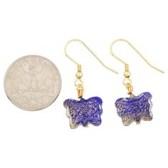 So feminine and unique, these Murano Glass Butterfly Earrings are for a woman who values Venetian elegance and fine Italian style. The earrings feature exquisite butterfly-shaped Murano Glass beads in rich blue color infused with 24K gold leaf sparkles. Gold-plated surgical steel ear hooks offer durability and allergy-free comfort. Our Gorgeous Venetian earrings handcrafted by Murano Glass masters in the ancient glassmaking tradition will magically transport you to the splendor and magical ambia Blue Butterfly Charm Jewelry For Party, Blue Butterfly Earrings As Gift, Elegant Blue Butterfly Jewelry, Blue Butterfly Earrings For Gift, Blue Butterfly Earrings Gift, Blue Butterfly Charm Earrings For Gift, Handmade Murano Glass Earrings For Gift, Blue Dangle Earrings With Butterfly Charm, Blue Butterfly Charm Dangle Earrings