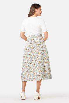 Featuring darling Robin birds & romantic cherry blossom florals, this printed midi skirt is an a-line fit- high waisted style- belt loops and removable waist tie- back zipper and button closure- made of the softest linen viscose blend- available in sage Product Code: PGFY024 Cotton Midi Skirt With Floral Print, Floral Print Cotton Midi Skirt, Rayon Skirt With Floral Print For Day Out, Rayon Floral Print Skirt For Day Out, Floral Print Rayon Skirt For Day Out, Garden Party Midi Skirt With Floral Print, Spring Belted Skirt For Day Out, Belted Skirt For Spring Day Out, Floral Print Long Skirt For Garden Party