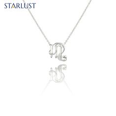 This eye catching pendant brings together two dramatic and dynamic star signs, Scorpio and Leo, in beautiful 14 karat gold, sterling silver, or platinum. The symbols of Scorpio, with the sting in the tail, and Leo, the lion’s curly tail are united. These are two fixed signs who are deeply loyal and, if lovers, can fall madly in love. They are fiercely protective of each other and can be a little possessive as they crave each other's attention. These signs are strongly attracted and this combinat 14k Gold Silver Necklace With Zodiac Sign, Silver 14k Gold Necklace With Zodiac Sign, Silver 14k Gold Necklaces With Zodiac Sign, White Gold Zodiac Sign Fine Jewelry, Sterling Silver Zodiac Jewelry In White Gold, Fine Jewelry White Gold Zodiac Sign, Fine Jewelry In White Gold With Zodiac Sign, Luxury Sterling Silver Zodiac Sign Necklaces, Luxury Silver Zodiac Sign Necklace