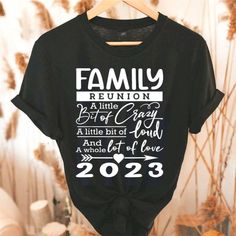 Family Reunion 2023 Funny Ain_t No Family Like The One I Got T-Shirt Discover Our Latest Range Of Versatile And Stylish T-Shirts (Gildan 5000), Where Style Harmonizes With Unparalleled Comfort! Featuring Sizes From S To 3xl And A Vibrant Spectrum Of Colors Such As Black, White, Sand, Green, Sport Grey, Red, Navy, And More, There's A Choice To Cater To Every Taste. Crafted With Precision Using Top-Notch Materials, Our T-Shirts Offer A Luxurious Sensation And An Impeccable Fit That Endures Through Family Reunion Shirt Design, Family Reunion T Shirt Ideas, Family Reunion Tshirts Ideas, Black Graphic Print T-shirt For Family Reunion, Family Reunion Tshirt Design Ideas, Black Short Sleeve T-shirt For Family Reunion, Black Tops With Graphic Print For Family Reunion, Black Graphic Print Tops For Family Reunion, Black Cotton T-shirt For Family Reunion