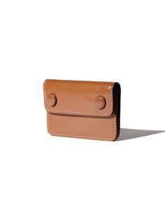 Editor's NoteLE MASQUE's wallet that will instantly adds a touch of liveliness to the look.- Simple and practical design- Snap button closure detail- Good to store cards, bills and coins- Extra card pocket on the back Measurements (in.)- Size: 4.06 in. * 2.76 in. * 0.67 in. Composition & Care- Cow Leather- Natural leather may have fine scratches and wrinkles- Avoid direct heat and moisture- Professional cleaning is neededDesigner- by LE MASQUE Compact Card Holder With Coin Pocket, Versatile Bifold Card Holder With Coin Pocket, Everyday Rectangular Trifold Wallet With Snap Closure, Versatile Brown Wallet With Card Slots, Versatile Brown Wallets With Interior Card Slots, Brown Travel Wallets With Magnetic Closure, Compact Card Holder With Card Slots For Everyday Use, Compact Card Holder With Card Slots, Versatile Brown Coin Purse With Card Slots