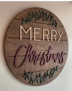 merry christmas sign hanging on the wall