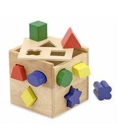 a wooden toy with shapes and colors