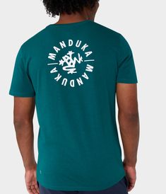 manduka-circle-deep-sea Green T-shirt With Back Print In Relaxed Fit, Relaxed Fit Green T-shirt With Back Print, Cotton Sporty Top With Print, Sporty Cotton Tops With Front And Back Print, Towel Series, Yoga Clothing, Yoga Shirts, Yoga For Men, Deep Sea