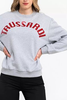 Unleash your inner fashionista with this effortlessly cool oversized sweatshirt from Trussardi. Crafted with a blend of sumptuous cotton and durable polyester, this Italian-made piece combines comfort with high-end style. The chic gray hue serves as the perfect canvas for the iconic, boldly printed Trussardi lettering adorning the chest. Ideal for those who love to make a statement with their casual wardrobe, it’s a must-have for anyone with an eye for trendsetting luxury. Material: 70% Cotton, Sweat Gris, Jeans And Flats, Fashion Forever, Sweatshirts Online, Round Neck Sweatshirts, Grey Prints, Oversized Pullover, Round Neck Sweaters, Sweaters Online