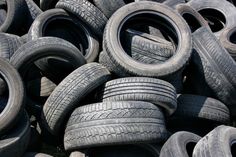 a pile of old tires piled on top of each other