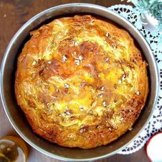 a baked pastry in a bowl on a table