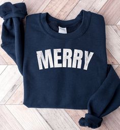 Retro Merry Christmas Sweatshirt, Women's Christmas Sweatshirt, Holiday Sweater, Cute Christmas Sweatshirt, Christmas Gift, Winter Sweatshirt Embrace the festive spirit with our Retro Merry Christmas Sweatshirt, a cozy and stylish holiday sweater that perfectly captures the joy of the season. Made for women who want to spread cheer wherever they go, this cute Christmas sweatshirt makes for an ideal gift and a must-have addition to your winter wardrobe--snag yours today and celebrate the holidays Christmas Crew Neck Cotton Sweater, Christmas Cotton Crew Neck Sweater, Winter Crew Neck Pre-shrunk T-shirt, Christmas Sweatshirt With Letter Print, Festive Christmas Crew Neck Sweatshirt, Christmas Sweatshirt With Letter Print In Relaxed Fit, Christmas Sweatshirt With Letter Print And Relaxed Fit, Christmas Letter Print Sweatshirt In Relaxed Fit, Christmas Letter Print Crew Neck Tops