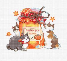 a cross stitch pattern with two cats sitting next to a jar of pumpkin jam and stars