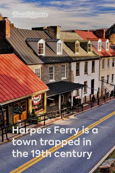 there is a sign that says harpers ferry is a town trapped in the 19th century