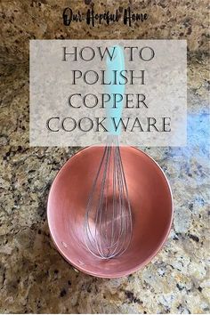 a pink bowl with a whisk in it and the words how to polish copper cookware