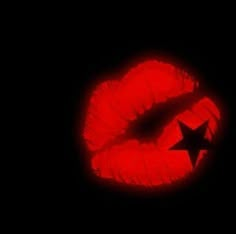 a red lipstick with a star on it's lip in the shape of a heart